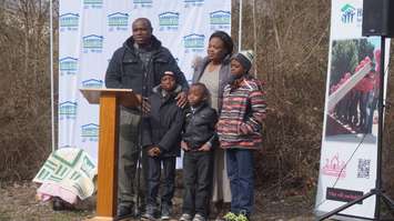 The Tshangala family speaks at a celebration ground breaking for their new home on Devine St. April 13, 2016 (BlackburnNews.com Photo by Briana Carnegie)