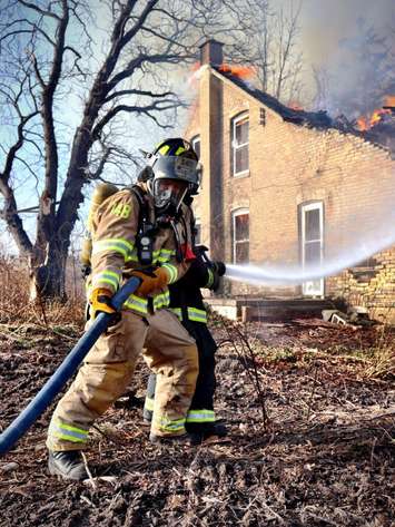 Fire at an abandoned home December 14, 2021. Photo courtesy of Sarnia Fire and Rescue via Twitter.