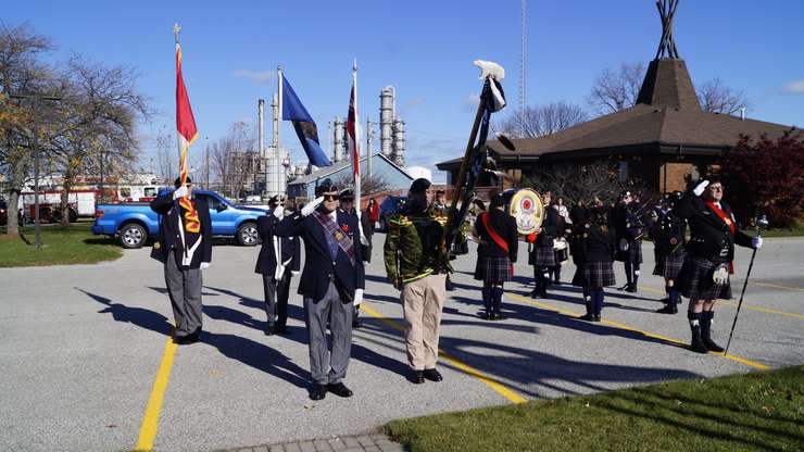 Flags and bagpipers at the Aamjiwnaang Remembrance Day Ceremony (Photo by: Lindsay Newman/Blackburn Media) 