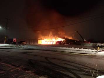 Fire crews battle a factory fire on Arnold St. in Wallaceburg, December 29, 2017. (Photo courtesy of Scott Ramey via Twitter)