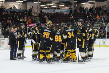 The Sarnia Sting gather after being eliminated by the Windsor Spitfires in Game 6 of the first round playoff matchup.  1 May 2022.  (Metcalfe Photography)