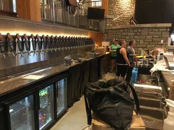 A look down the full bar inside Cowbell, ready to pour an assortment of in-house craft beers. August 3rd, 2017 (Photo by Ryan Drury)