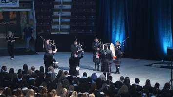 Bagpipes play as students are ushered to their seats during the morning convocation ceremony. June 7, 2023. (Photo by Natalia Vega)