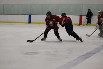 Students at the FJ Brennan Centre of Excellence & Innovation Hockey Canada Skills Academy take part in practice, March 5, 2015. (Photo by Mike Vlasveld)