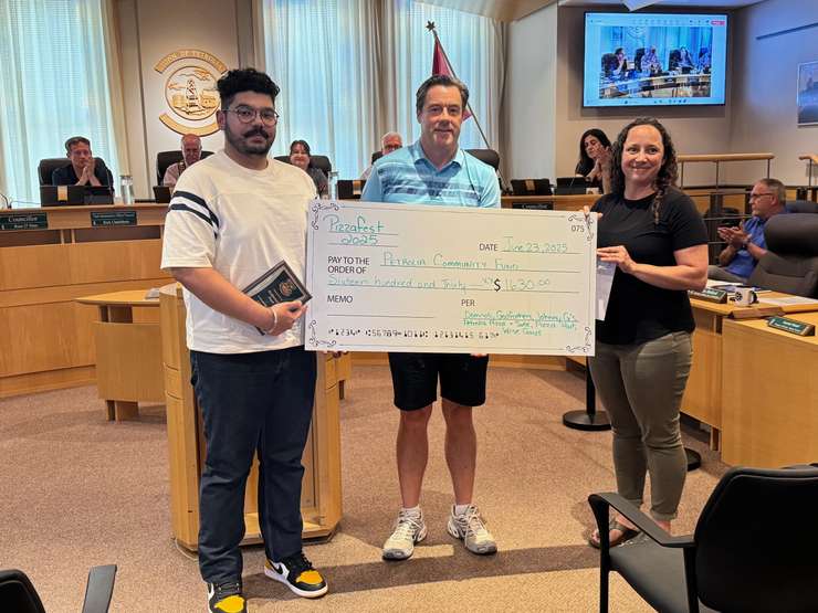 Proceeds from the 12th annual Petrolia Pizzafest were given to the Petrolia Community Fund. (left to right) Representative from Godfathers Pizza, Sarnia Community Foundation/Petrolia Community Fund Executive Director Mike Barron, and Director of Parks, Recreation and Facilities Julie Bullock. June 23, 2025. (Photo courtesy of the Town of Petrolia)