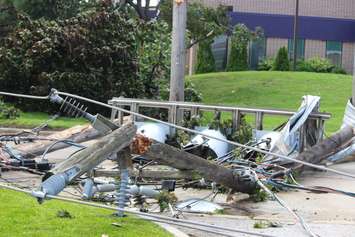 Crews assess and clean up the damage left near the EC Row Expressway and Central Avenue in Windsor on August 25, 2016 after a tornado hit the area. (Photo by Ricardo Veneza)