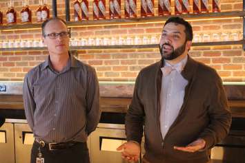 Hiram Walker & Sons Master Blender Don Livermore and Windsor Eats Co-Owner Adriano Ciotoli welcome a media group to the new JP Wiser's Brand Centre on Riverside Dr. in Windsor, March 22, 2017. (Photo by Mike Vlasveld)