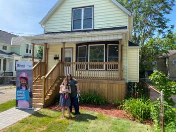 Kelly Edwards and her daughter Piper in front of their new Habitat for Humanity home on Bright Street in Sarnia. June 26, 2020 Photo by Melanie Irwin