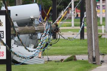A pole fire causes a transformer to fall on Tecumseh Rd. at Southfield Dr. in Tecumseh, June 18, 2015. (Photo by Jason Viau)