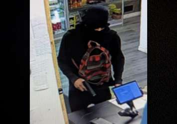 A suspect wanted in an armed robbery in west Windsor is seen in a security camera image on October 1, 2025. Photo provided by Windsor police