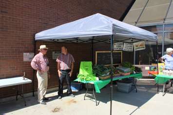 Vendors take part in a Farmers Market outside the Civic Centre in Chatham to kick off Local Food Week. June 6, 2016. (Photo by Matt Weverink)