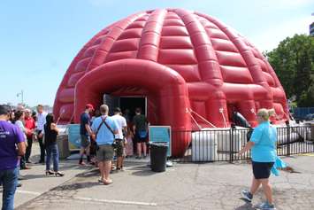 Guests line up to view the 360 film Horizon at the SesquiDome in Windsor, July 7, 2017. Photo by Mark Brown/Blackburn News)