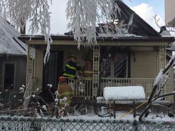 Firefighters at the scene of a house fire in the 700-block of Windsor Ave. (Photo by Jason Viau.)