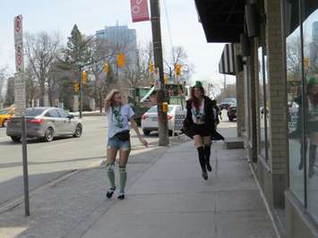 St. Patrick's Day revelers running on Richmond Row. (File photo by Miranda Chant, Blackburn News.)
