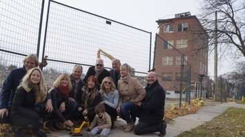 Members of GFive Inc. alongside three-year-old Corban Burn outside the site of the old Sarnia General Hospital. November 12, 2018. (Photo by Colin Gowdy, BlackburnNews)