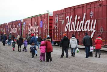 Hundreds gather in Windsor to watch as the CP Holiday Train pulls in. (Photo by Jason Viau)