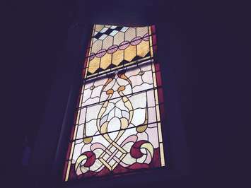 Stained glass window in former Chatham Baptist Church, July 21, 2015 (Photo by Simon Crouch) 
