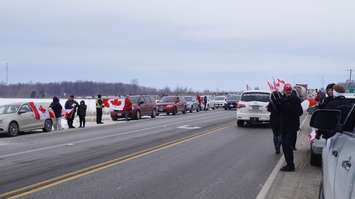 Supporters lined along Oil Heritage Road. January 27, 2022. (Photo by Natalia Vega)