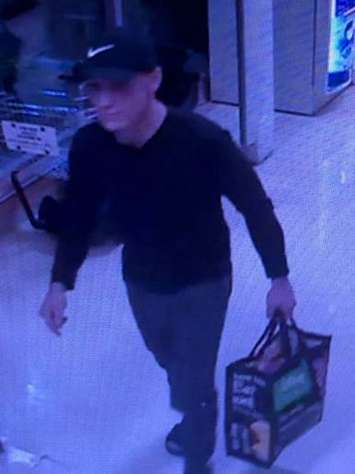 Chatham-Kent police are looking to identify this man in connection with a theft investigation at the Sobeys in Blenheim. (Photo courtesy of Chatham-Kent police)