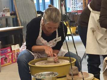Sarah Woodley from Fox FM participates in the Bowl-a-Thon pottery event leading up to its Empty Bowls fundraiser in March. February 10, 2017 (BlackburnNews.com Photo by Melanie Irwin)