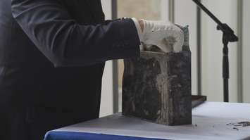 Sarnia Historical Society President Ron RealeSmith opens a Sarnia General Hospital time capsule from 1895. September 27, 2019 Photo by Melanie Irwin