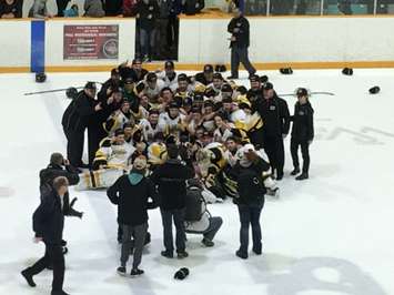 The Siskins gather for a team photo on the ice after winning the 2019 Cherrey Cup. April 7th, 2019 (Photo by Ryan Drury)