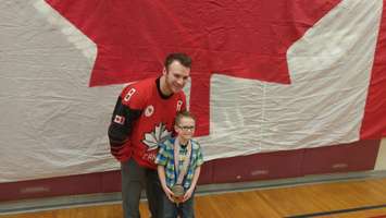 Tyler McGregor poses with Rhys O'Halloran during a ceremony at North Lambton Secondary School. April 3, 2018. (Photo by Colin Gowdy, Blackburn News)