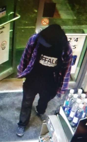 A person of interest wanted after a fire Monday at Wineology in Tecumseh. (Photo courtesy of the Ontario Provincial Police.)