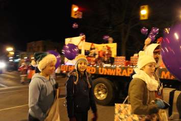 Local residents line the streets of Downtown Chatham during the Santa Clause Parade, November 20, 2015. (Photo by Ricardo Veneza)