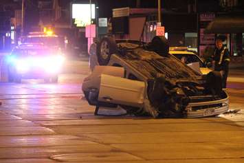 One vehicle flipped following a collision at the intersection of Howard Ave. and Tecumseh Rd. E, May 19, 2015. (Photo by Jason Viau)
