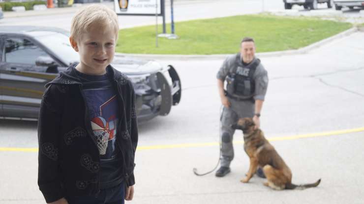 Winner of the Name the K9 contest, six-year-old Benny Canie. April 23, 2024. (Photo by Natalia Vega)