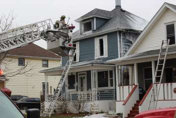 Windsor fire battling a blaze on Hickory St. in Ford City, March 23, 2016 (Photo by Maureen Revait)