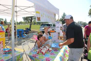 Unifor Local 444 member, Mike Mallott cools down with a drink from the Lemonade Brigade at the 2018 Labour Day Parade in Windsor, September 3, 2018. (Photo by Adelle Loiselle)