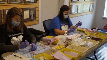 Staff at at the high-output COVID immunization clinic at Clearwater Arena.  25 June 2021.  (BlackburnNews.com file photo)