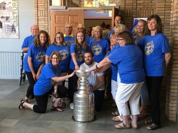 O'Reilly poses with the Cup with Goderich Town Staff. (Photo by Ryan Drury)