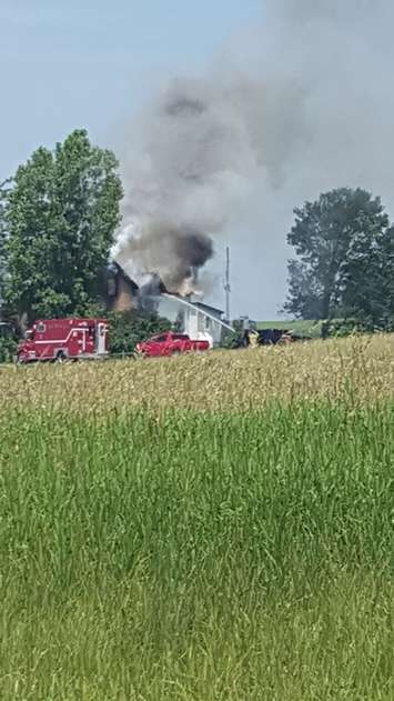 Fire crews on scene of a house fire near Auburn on July 5, 2019. (Photo by Stacy Kuntz-Eichler)