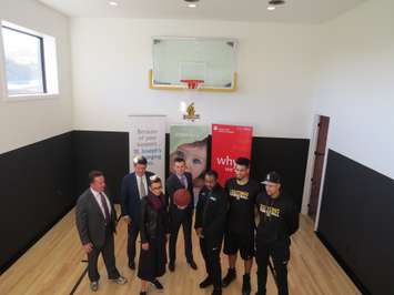 Dream Lottery officials with members of the London Lightning inside the dream home at 2074 Ironwood Rd. (Photo by Miranda Chant, Blackburn News)