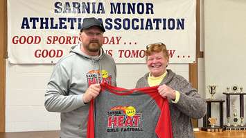 L to R.. Sarnia Heat Girls Fastball Chairman Aaron Zimmer and SMAA President Lynn LeFaive. Submitted Photo