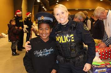 JJ Morrison with Constable Nicole Mailloux. December 17, 2016. Photo by Natalia Vega)