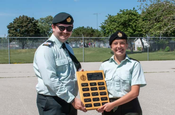 Joelle Sposib (right) is presented the Most Proficient Cadet Award. June 13, 2026 Photo courtesy of officer Cadet Jeremy Day.