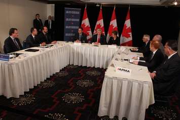 Prime Minister Stephen Harper chairs a roundtable discussion about auto manufacturing at the Waterfront Hotel in downtown Windsor, May 13, 2015. (Photo by Jason Viau)
