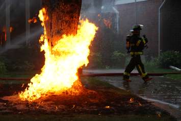 Lightning strikes a gas line in the 1100-block of Belleperche Pl., September 3, 2015. (Photo by Jason Viau)