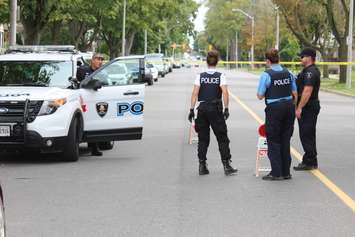 Windsor police investigate a shooting on Howard Ave. at Erie St., September 9, 2015. (Photo by Jason Viau)