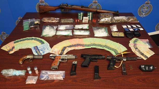 Police seize drugs, ammo in large bust