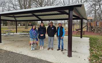 Miss Oneida Shelby Phillips, Ontario Trillium Volunteer Amelia Sloan, Chief Todd Cornelius, and Oneida Community Centre Facilities Manager Jason Doxtator at the new pavilion at the Oneida Community Centre. Photo provided by the Oneida Nation of the Thames.