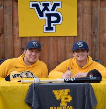 Nicholas George (left) accepting a scholarship from William Penn University alongside current Statemen and fellow Sarnia-native, Jamieson Hart (left). 2019. (Photo provided by George)
