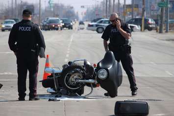 One person has been sent to hospital following a crash at the intersection of Lauzon Rd. and McHugh St., April 1, 2015. (Photo by Jason Viau)