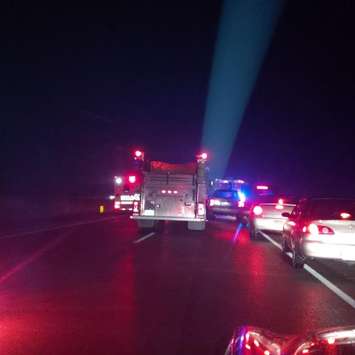 Emergency crews respond to a fatal crash on Hwy. 402 near Oil Heritage Rd., December 13, 2014. (Submitted photo) 