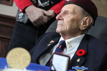 Local World War II veteran Ralph Mayville speaks with reporters on February 6, 2015 about receiving the Congressional Gold Medal. (Photo by Jason Viau)