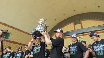 London Knights co-captains Mitchell Marner and Christian Dvorak raise the Memorial Cup at Victoria Park, May 30, 2016. Photo by Miranda Chant, Blackburn News.